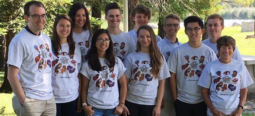 students and mentors posed as a group outside